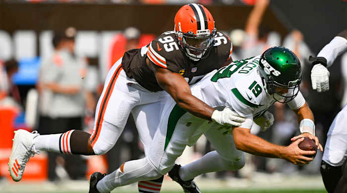 Cleveland Browns defensive end Myles Garrett (95) sacks New York Jets quarterback Joe Flacco (19) during the first half of an NFL football game, Sunday, Sept. 18, 2022, in Cleveland.
